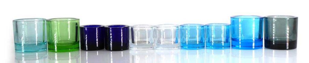 A set of ten Finnish Iittala 'Marimekko' votive holders in various colours and two sizes, h. 8 and 6