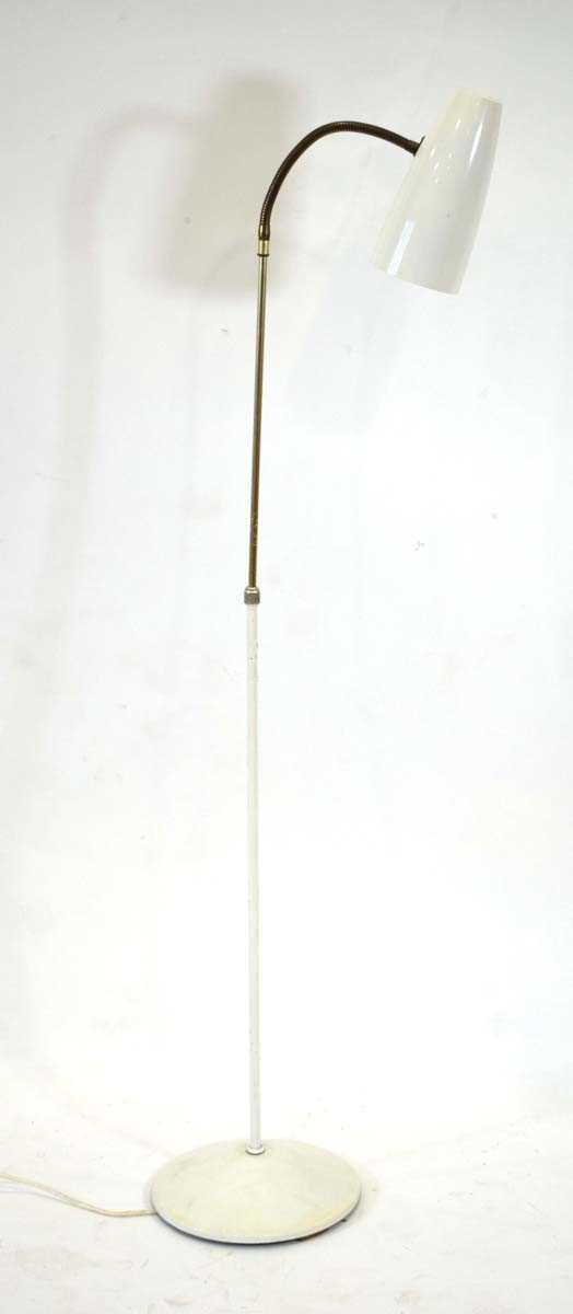 A 1960's white enamelled adjustable standard lamp with a brass flex Flex floppy.