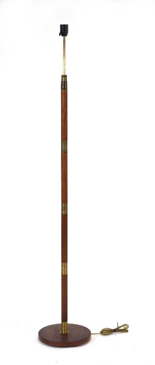 A 1960/70's Danish teak standard floor lamp with brass intersections Lead cut, working order