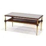 In the Hollywood Regency manner, a 1970's (?)Italian rectangular coffee table with brass classical