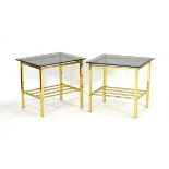 A pair of 1970's brass side tables with later smoked glass surfaces, 50 x 40 x 47 cm (2)