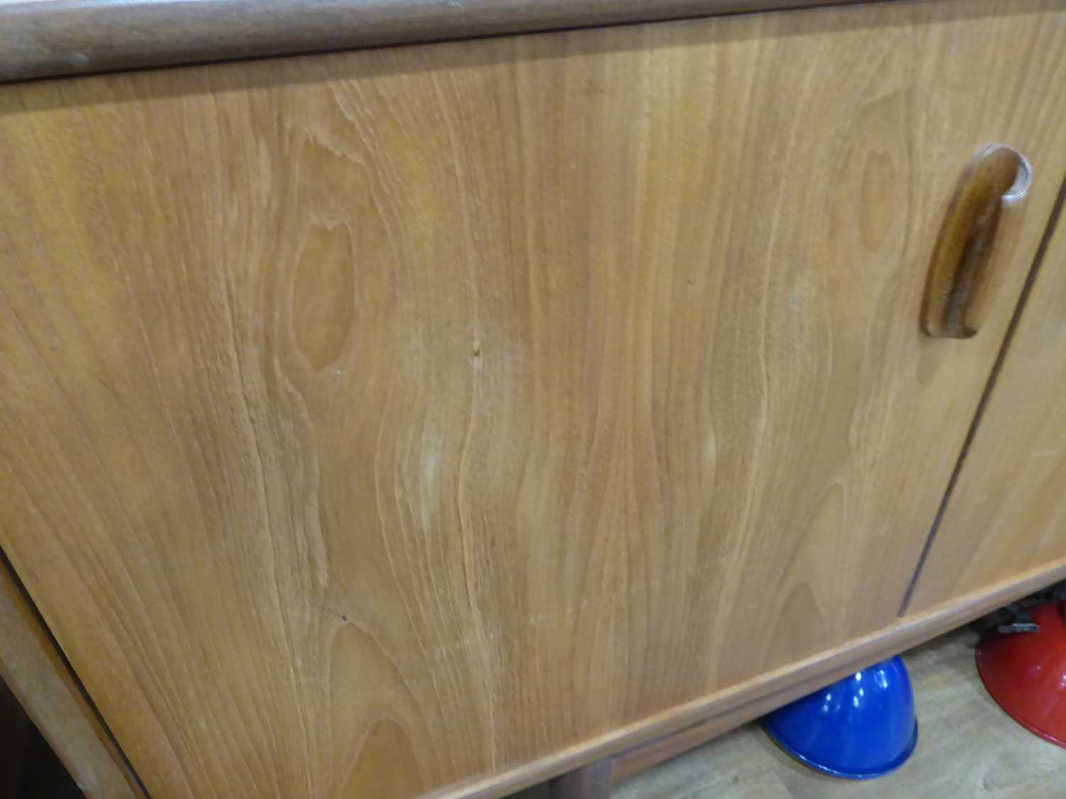 A 1960's G-Plan teak sideboard with a pair of doors, four drawers and a fall-front door, on tapering - Image 5 of 25