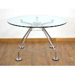 Lord Norman Foster for Tecno, a 'Nomos' table, the glass circular surface resting on a chromed base,