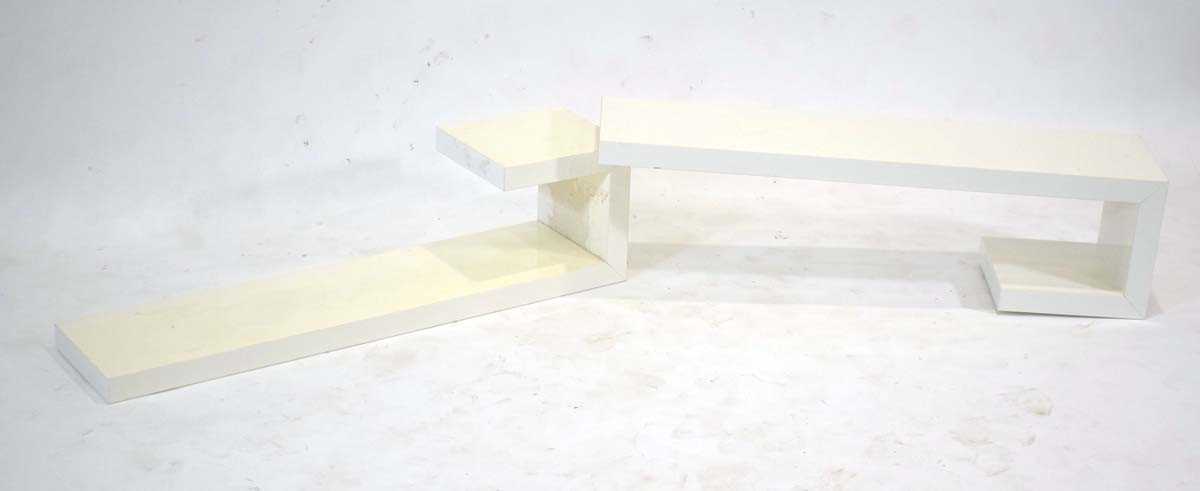 A pair of Italian white laminate wall shelves by Calligaris, labelled, 90 x 22 x 22 cm