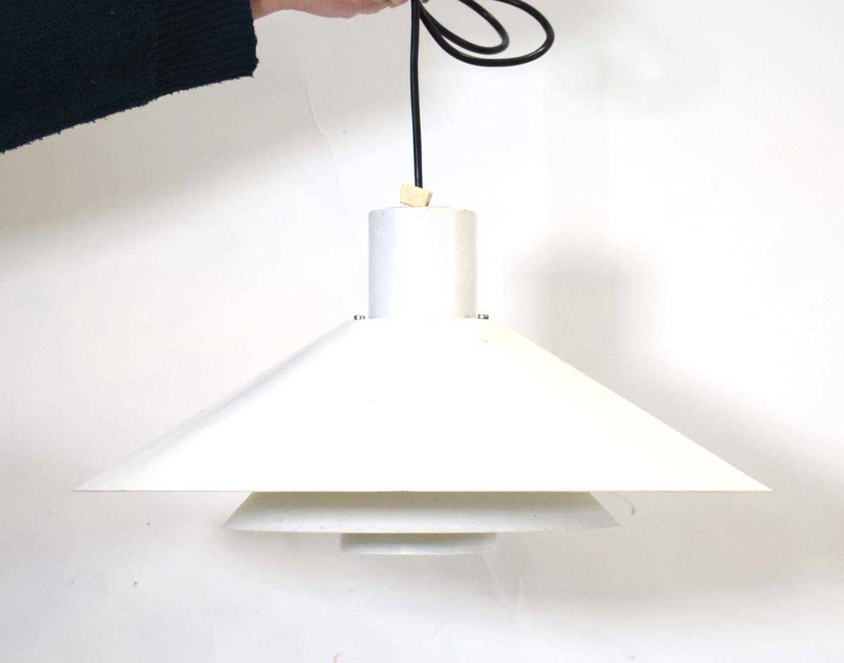 A 1970's Danish white enamelled three-tier ceiling light with a red highlight