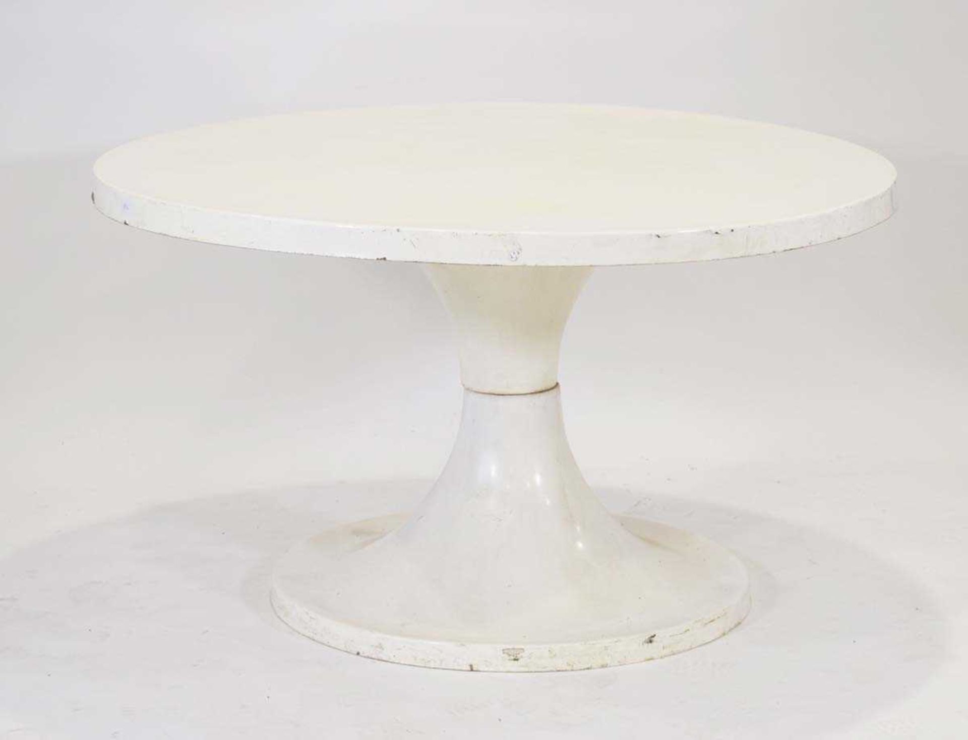 A 1960/70's fibreglass table, the white surface resting on an hour-glass shape base, di. 120 cm