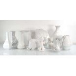 A group of German & Danish white glazed porcelain vases, money-box, figures etc. by Lorenz
