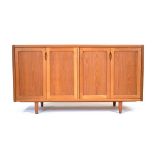 A 1960's 'd-Scan' of Singapore teak sideboard with four moulded doors, on tapering legs, w. 155