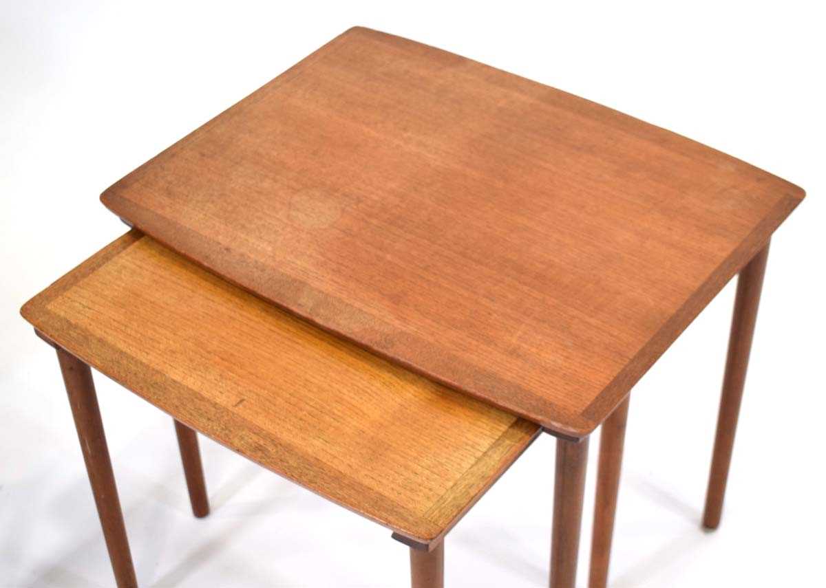 A 1960's Danish nest of three teak and crossbanded occasional tables by Mobelintarsia, label to - Image 2 of 2