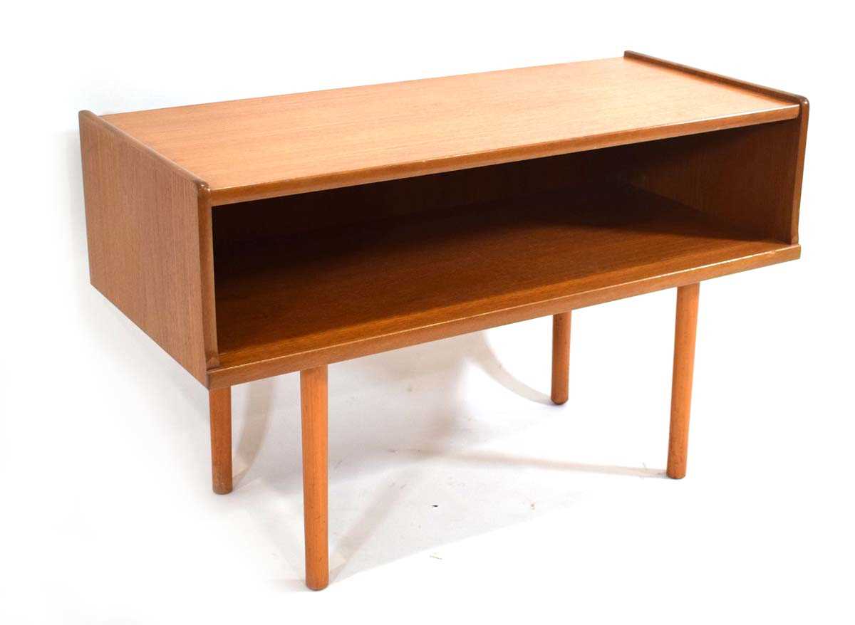 A 1970's teak open side/console table on later cylindrical legs, w. 102 cm