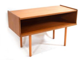 A 1970's teak open side/console table on later cylindrical legs, w. 102 cm