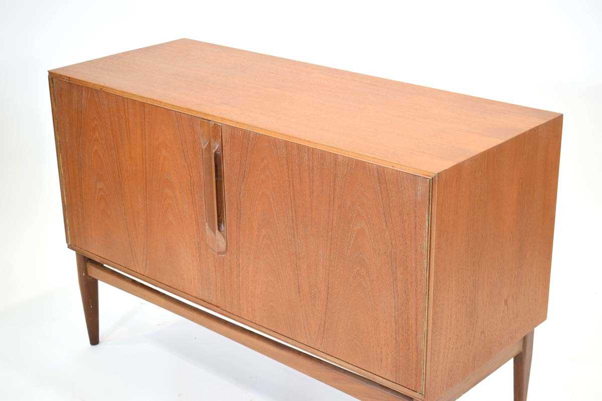 A 1960/70's McIntosh Furniture teak sideboard, the two doors with moulded handles, on triangular - Image 2 of 6