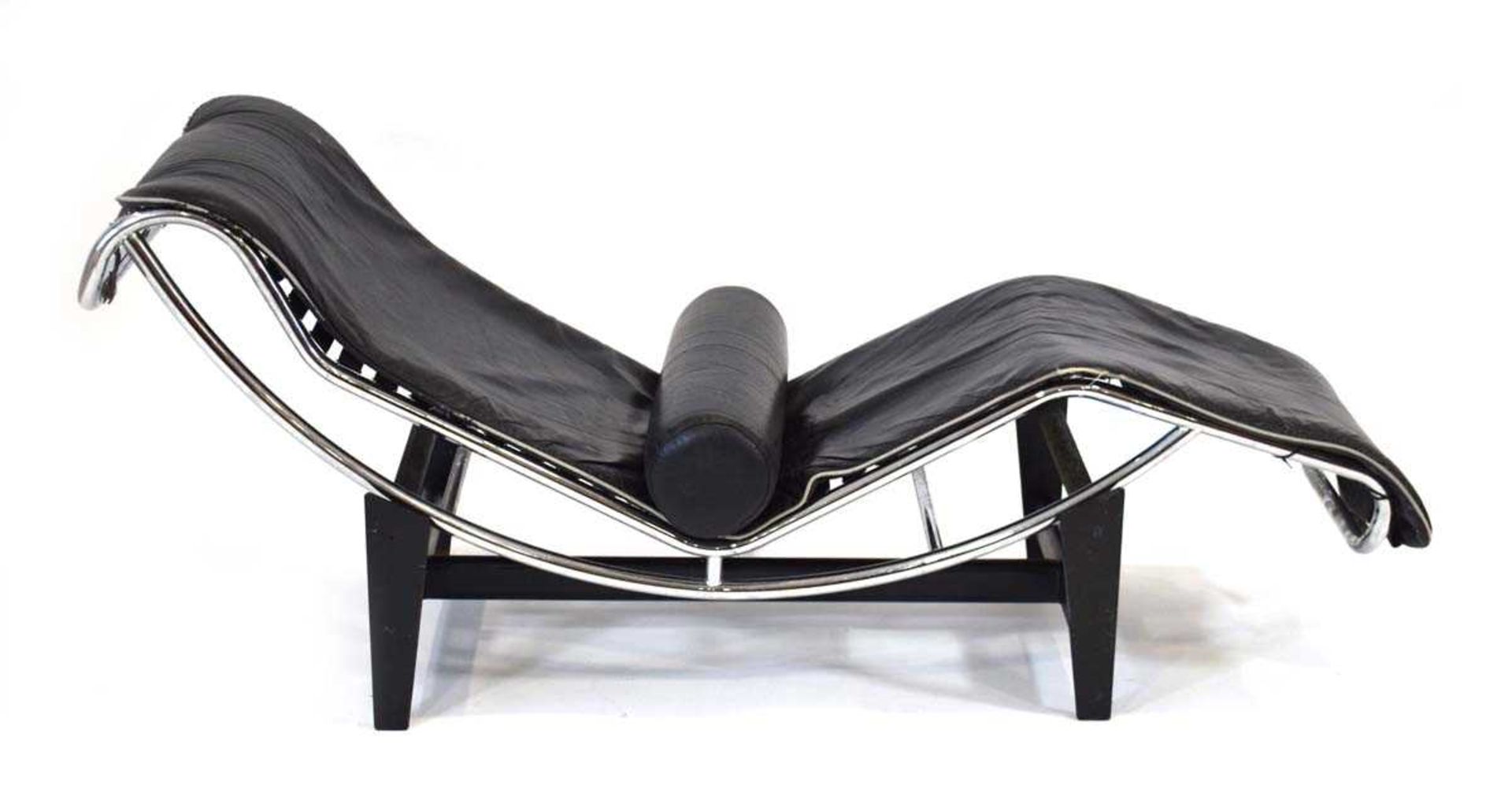 After Le Corbusier, Charlotte Perriand and Pierre Jeanneret, a 1960/70's LC4-style chaise lounge,