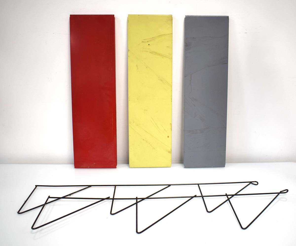 A 1960's Dutch three-tier wall shelf in red, blue and yellow, w. 55 cm