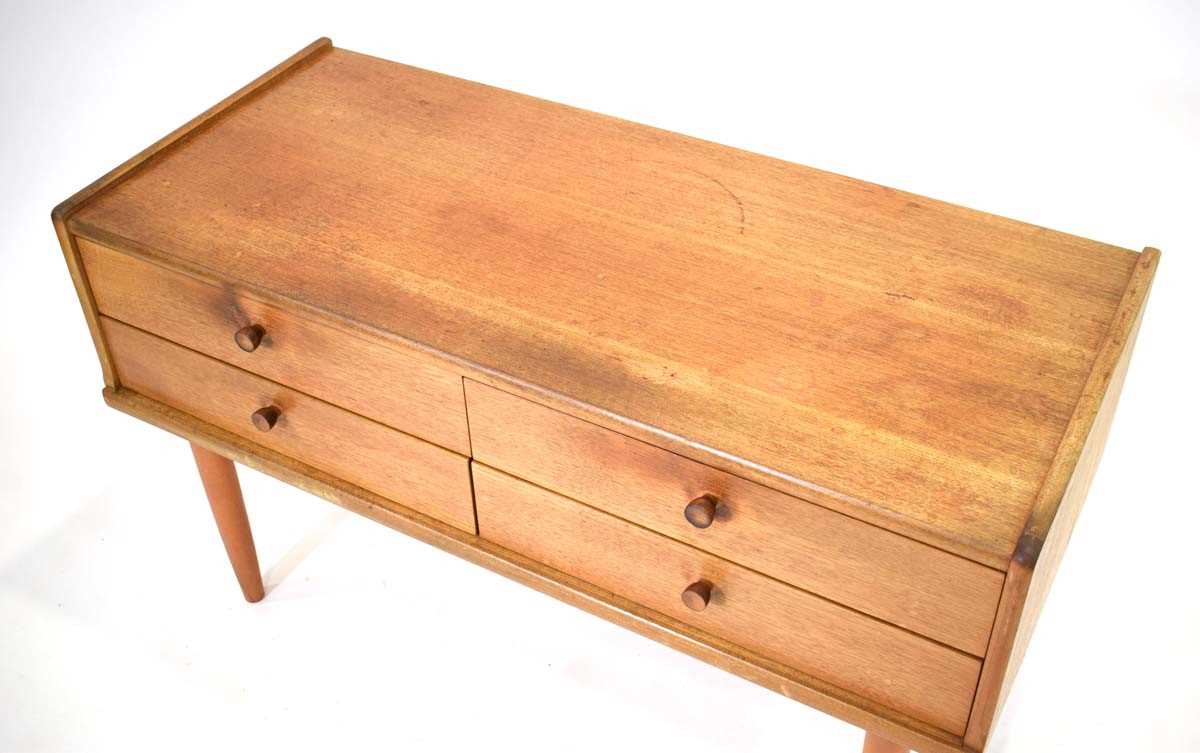 A 1970's teak four-drawer chest on later slender legs, 102 x 45 x 60 cm - Image 2 of 2