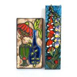 A 1960's German wall plaque decorated with foxgloves, 50 x 12 cm, together with another plaque