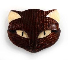 A French brooch by Lea Stein modelled as a cat face in 'bronze'