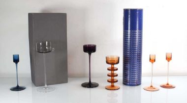 A group of six Wedgwood glass candlesticks, one cased, together with a cased Rosenthal Studio-Line