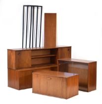 An Avalon teak modular shelving system including three uprights, a three-drawer and two-door