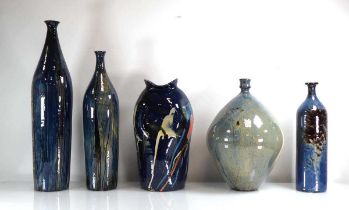 A graduated set of three stoneware bottle vases, max h. 54 cm, together with two further similar