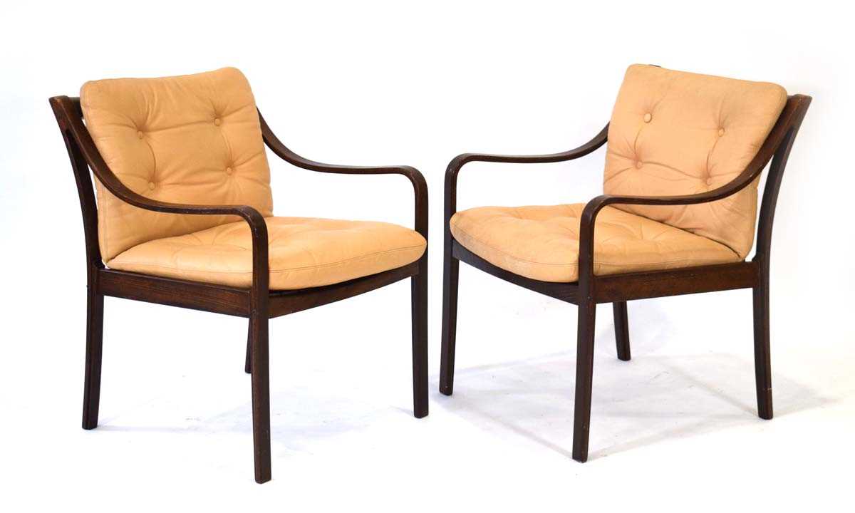 A pair of 1960's simulated rosewood laminate armchairs manufactured by JM Birking *Sold subject to