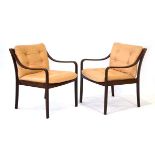 A pair of 1960's simulated rosewood laminate armchairs manufactured by JM Birking *Sold subject to