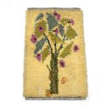 A Swedish wool rya wall hanging, the yellow ground depicting a bright tree, 98 x 61 cm