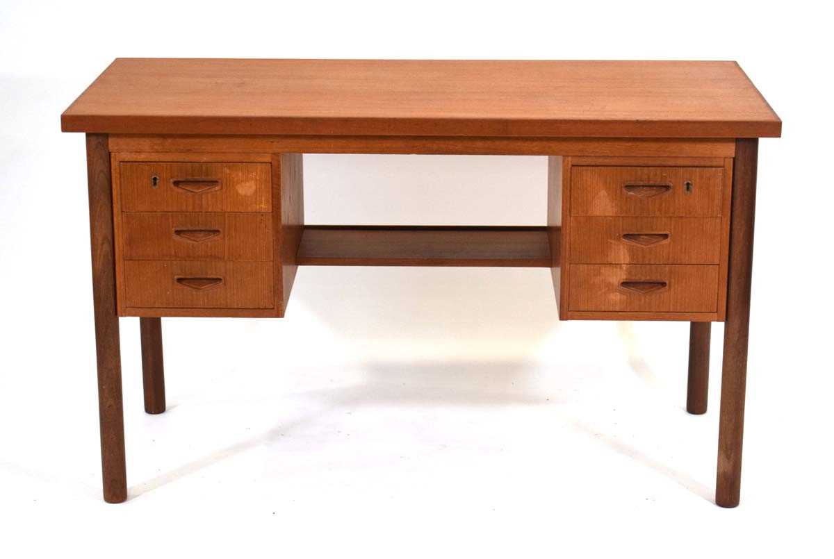 A 1960's Danish teak and crossbanded kneehole desk, the rectangular surface over six drawers with an - Image 2 of 3