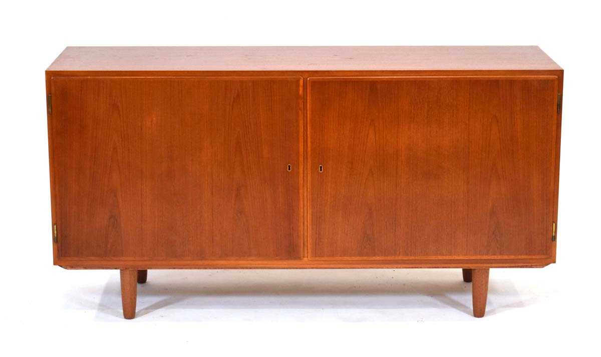 In the manner of Poul Hundevad, a 1960's Danish teak and crossbanded sideboard, the two doors - Image 2 of 2