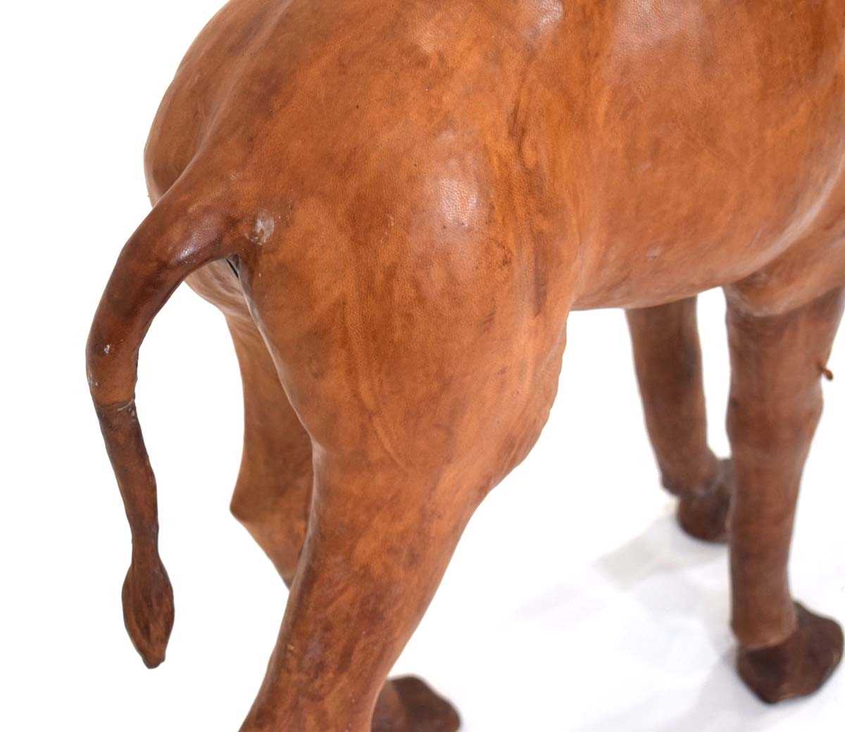 In the manner of Liberty of London, a leather-clad figure modelled as a camel, h. 91 cm - Bild 4 aus 4