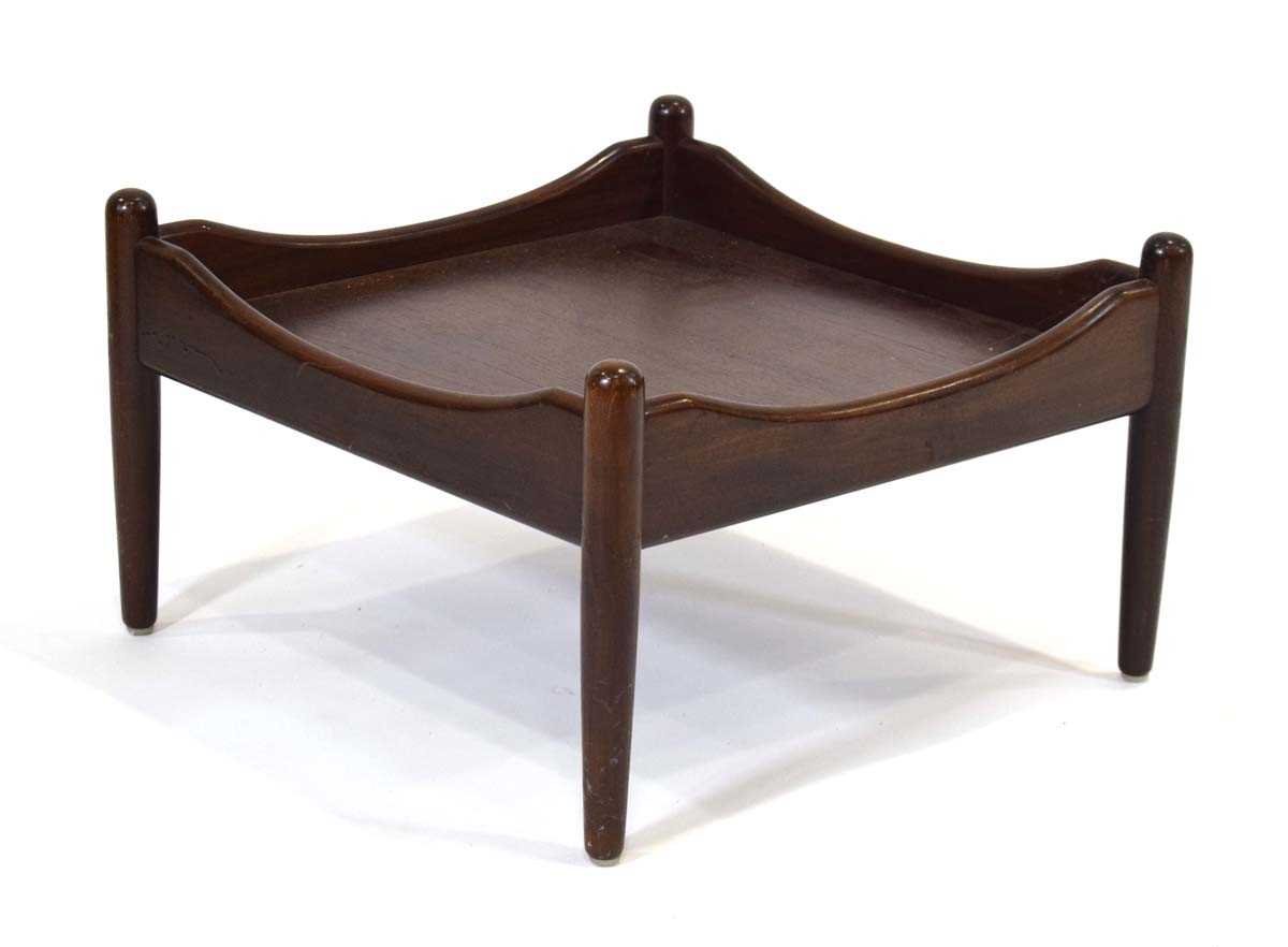 A (?)Norwegian square coffee table in stained beech with undulating sides and circular supports,