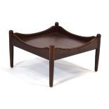 A (?)Norwegian square coffee table in stained beech with undulating sides and circular supports,