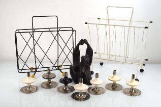 A set of seven candle holders in the style of Nagel, together with an Austin Sculptures figural