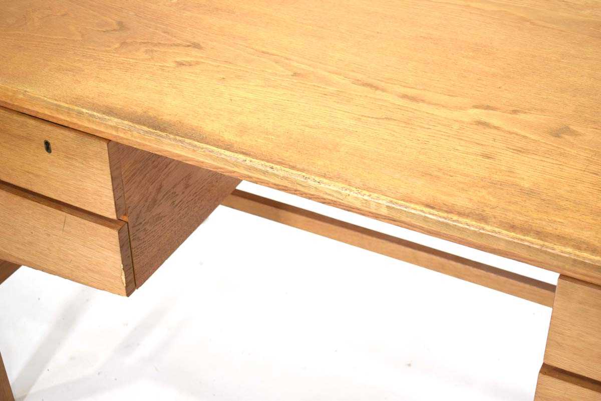 A 1960/70's Danish oak and crossbanded desk with four drawers on square straight supports, in the - Image 2 of 4