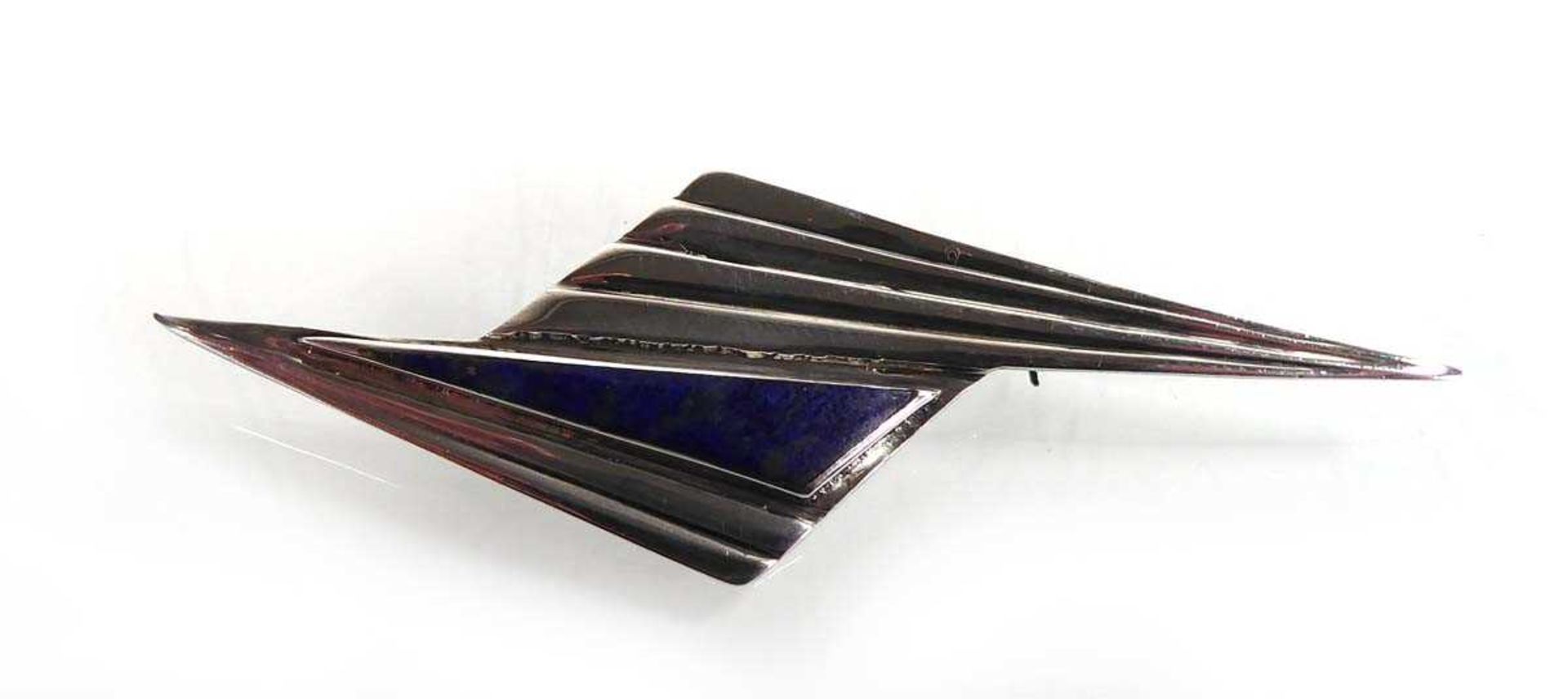 A silver and lapis lazuli brooch/pin of Art Deco form, stamped 925 Slightly mis-shapened and with