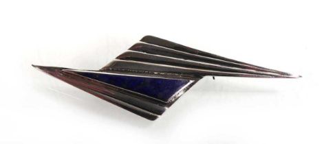 A silver and lapis lazuli brooch/pin of Art Deco form, stamped 925 Slightly mis-shapened and with