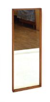 A 1960's teak-framed rectangular wall mirror, 90 x 30 cm