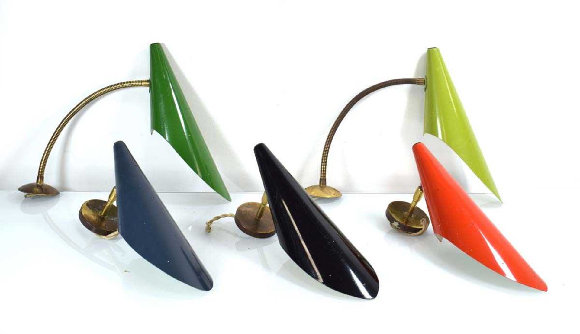 In the manner of Stilnovo, a set of five 1950's enamelled wall lights including two gooseneck