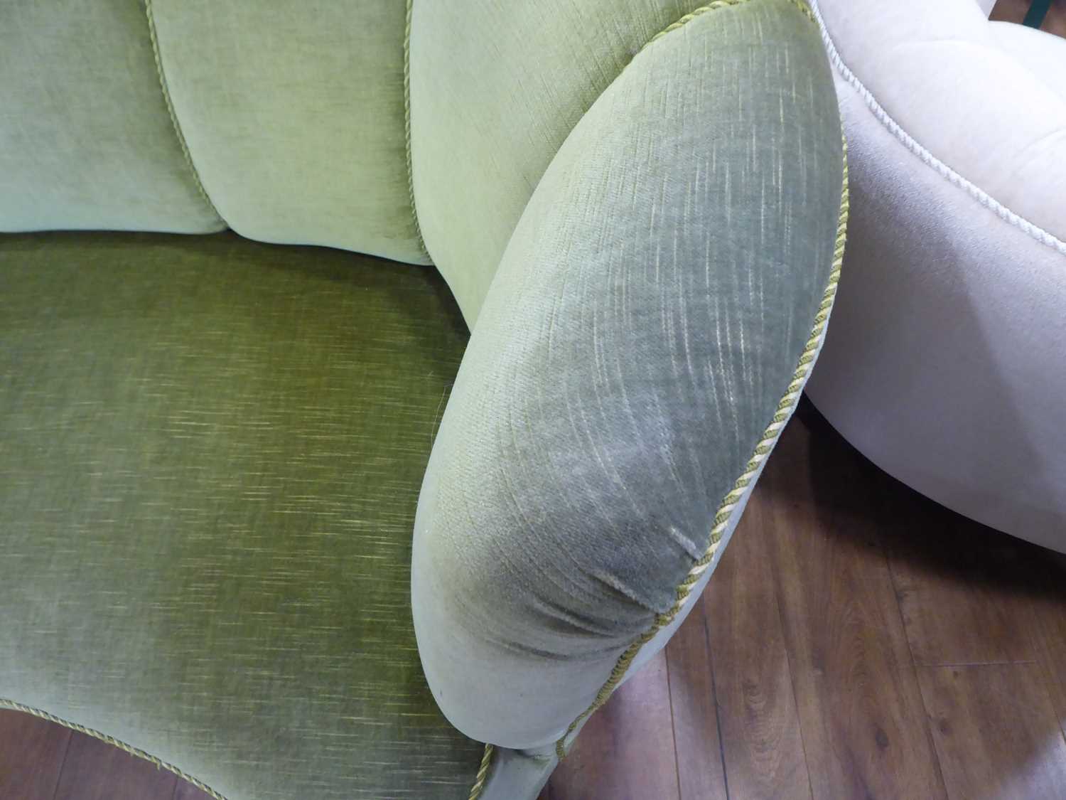 A 1950's Danish 'Banana' sofa upholstered in green on teak triangular feet *Sold subject to our Soft - Image 7 of 7