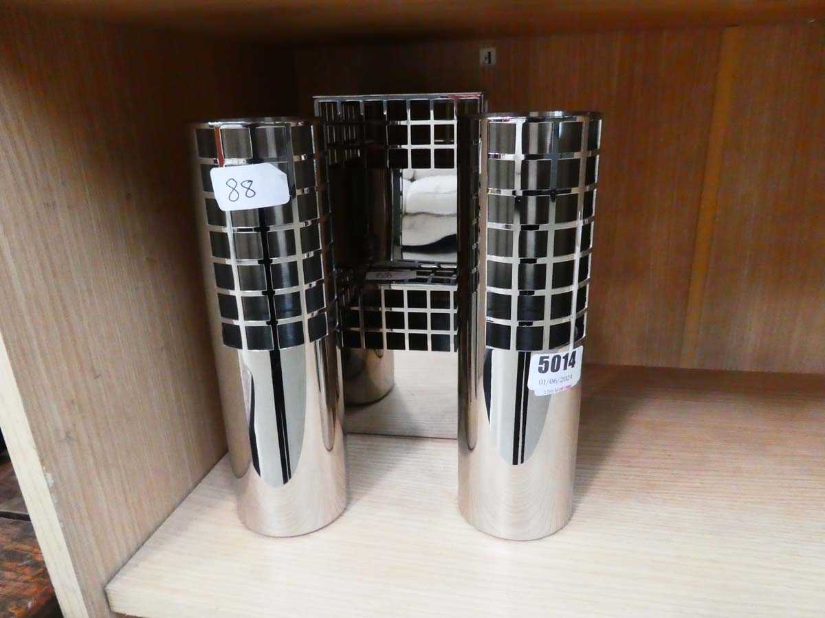 A set of four Georg Jensen 'Matrix' stainless steel vases including two cubes and two cylinders (4)