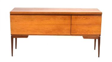 A 1970's teak sideboard in the manner of White & Newton, on associated tapering legs, 153 x 49 x