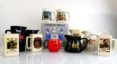 A Collection of 11 Whisky Water Jugs including Macallan, White Horse, Strong's, Black & White plus a