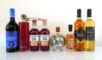 +VAT 8 bottles, 1x Christmas Globe Gin Liqueur 20% 70cl, 1x Downpour Oak Aged Negroni 27% 70cl, 1x