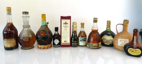 A Mixed lot including Fullers 2002 Vintage Ale, Bols Apricot Brandy clockwork Ballerina and other