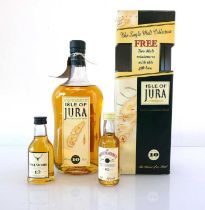 A bottle of Isle of Jura 10 year old Single Malt Scotch Whisky circa 1990's with box & miniatures of