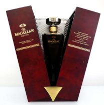 A Decanter bottle of The MACALLAN The 1824 Series Oscuro Highland Single Malt Scotch Whisky with box