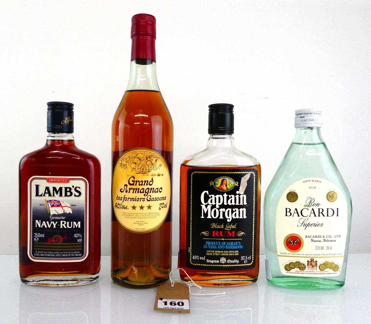 4 assoeted bottles, 1x Grand Armagnac 3 star des fermiers Gascoins 40% 70cl, 1x Lamb's Navy Rum