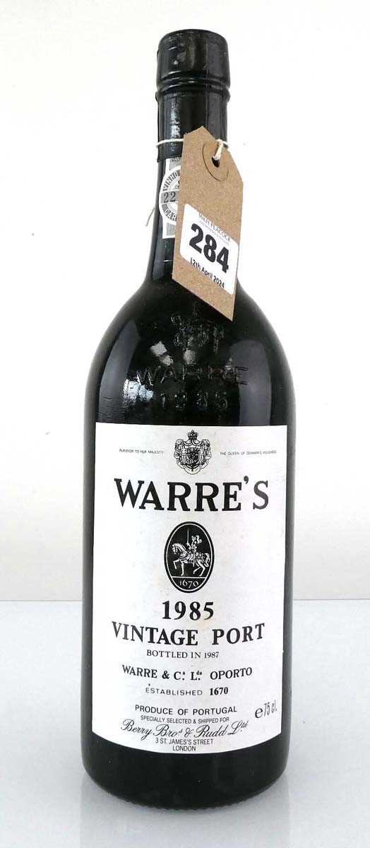 A bottle of Warre's 1985 Vintage Port (ullage into neck)