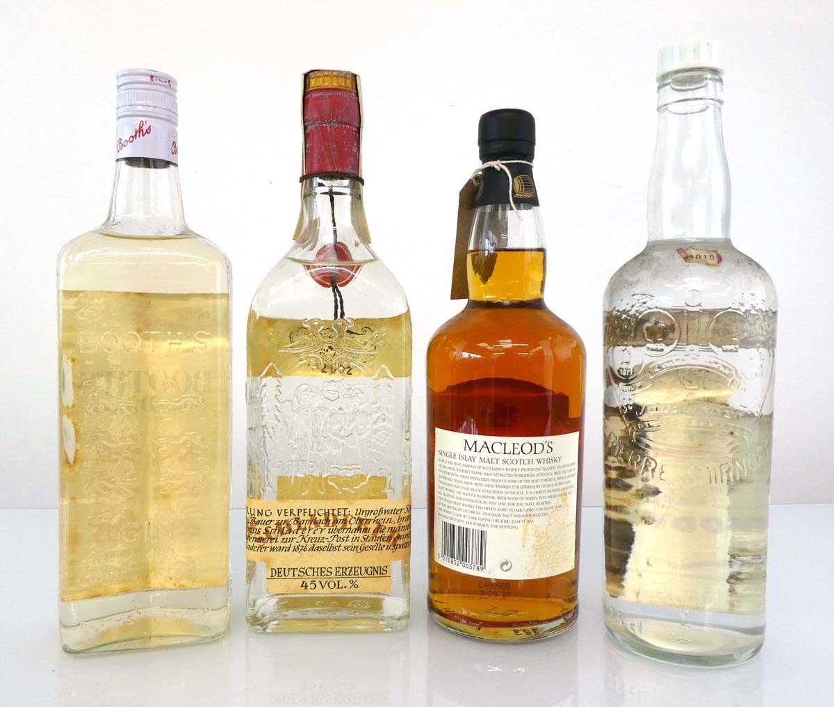 4 bottles, 1x Macleod's Islay 8 year old Single Malt Scotch Whisky 40% 70cl, 1x Booths Finest Dry - Image 2 of 2