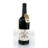 A bottle of Taylor Fladgate & Yeatman Taylor's Quinta De Vargellas 1976 Vintage Port (ullage top